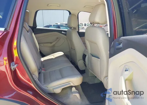 2014 Ford Escape Titanium z USA, uszkodzony, nr VIN 1FMCU0J9XEUA89585